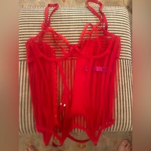 Agent Provocuteur

Corset 34 C
